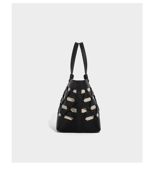 Structured woven lattice tote bag with cream lining, dual top handles, detachable crossbody strap, and silver-tone hardware