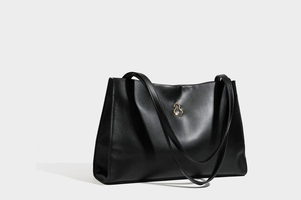 Structured rectangular shoulder tote bag with smooth leather-look finish, long double straps, and gold-tone gourd emblem on