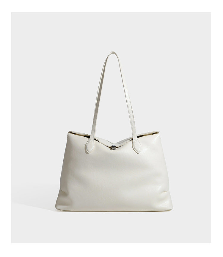 Large leather-look tote shoulder bag with slim double straps and silver-tone turn-lock closure, detail view 14