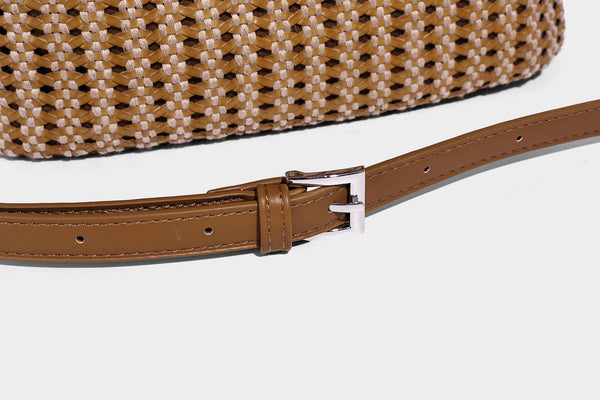 Small structured woven tote crossbody bag with ring top handle, leather-look brown trim, front patch pocket, and detachable