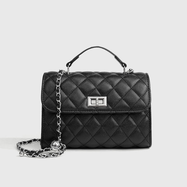 Small structured diamond-quilted flap satchel bag with silver-tone chain strap and turn-lock closure, detail view 6