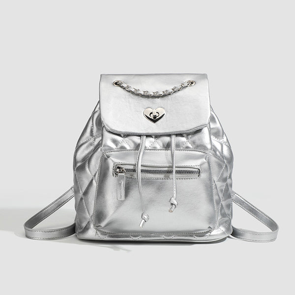 Quilted leather-look backpack with heart turn-lock clasp and woven chain handles, front view