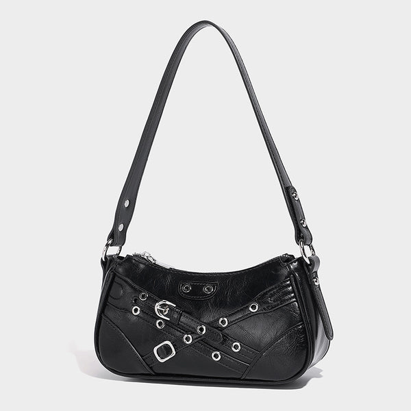 Compact moto-inspired shoulder bag with crisscross grommet strap detail, glossy textured finish, and adjustable crossbody