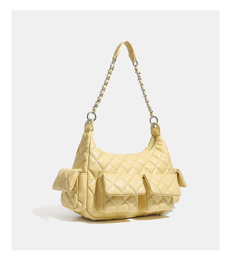 Off-white quilted leather-look hobo shoulder bag with diamond stitching, chain-and-strap handle, two front flap pockets