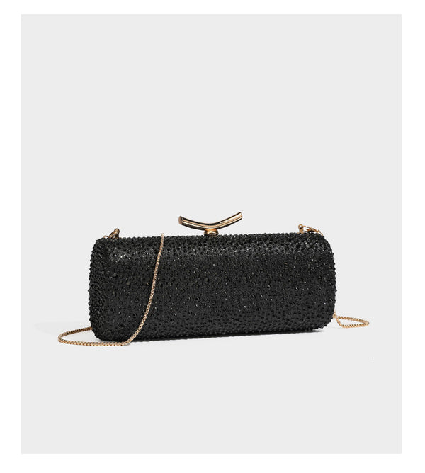 Structured rectangular hard-case clutch bag covered in all-over rhinestone crystal embellishment with curved kiss-lock top