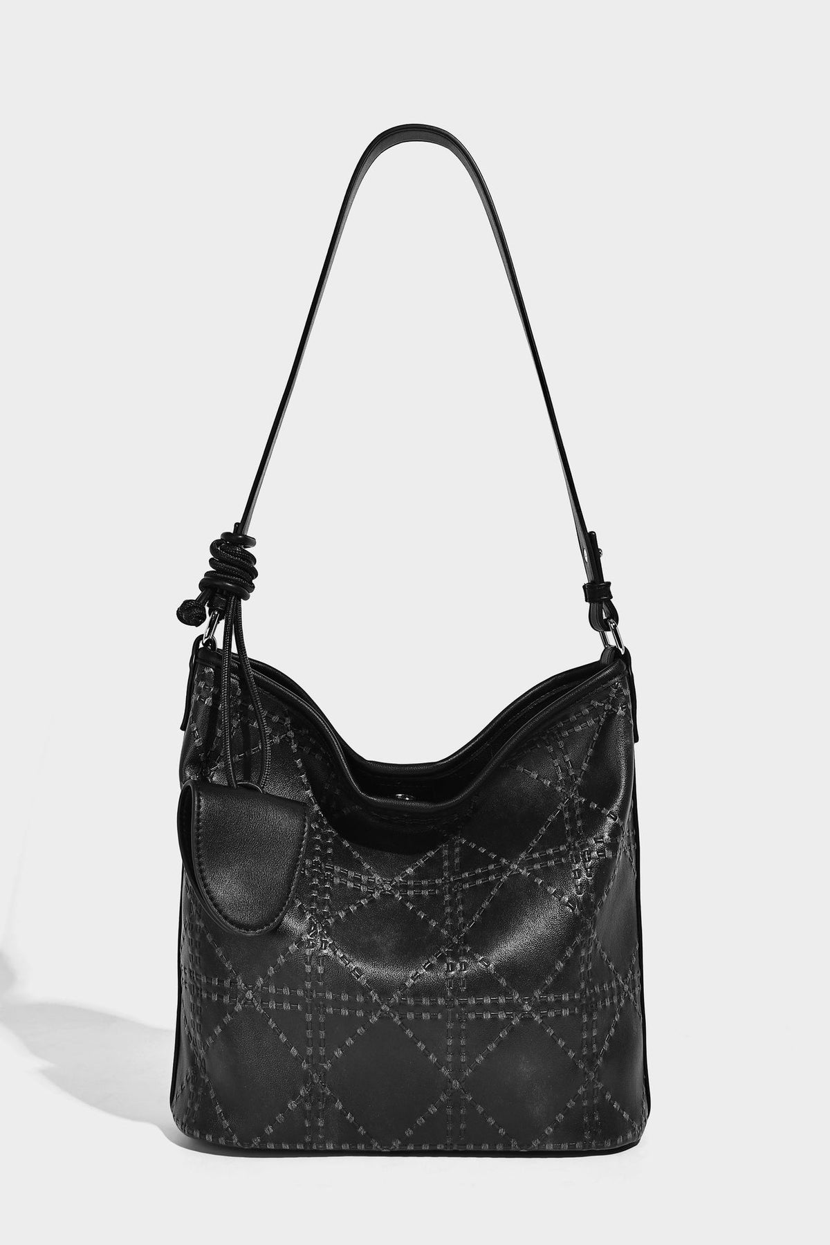 Diamond-quilted leather-look bucket shoulder bag with knotted strap accent and attached mini pouch, detail view 17