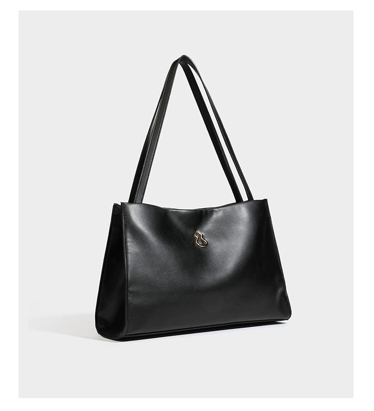 Structured rectangular shoulder tote bag with smooth leather-look finish, long double straps, and gold-tone gourd emblem on
