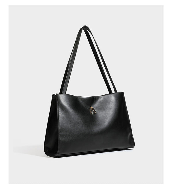 Structured rectangular shoulder tote bag with smooth leather-look finish, long double straps, and gold-tone gourd emblem on