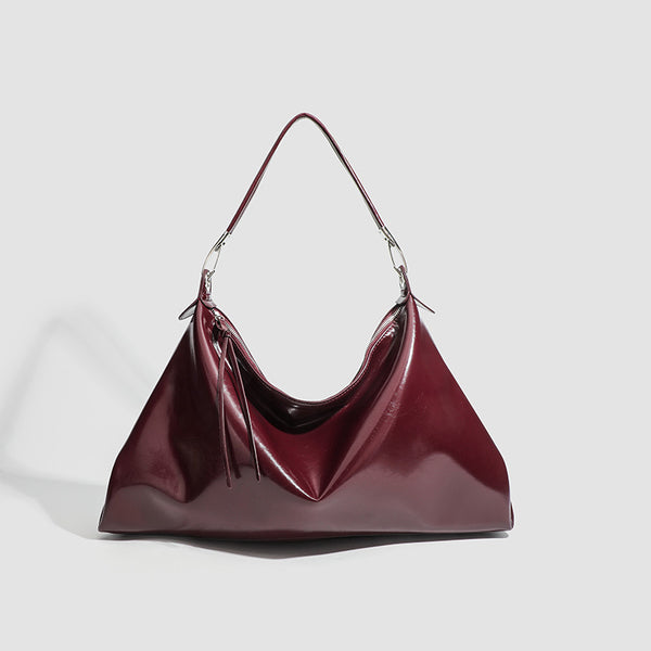 Glossy structured shoulder tote bag with silver-tone hardware and top zip closure, detail view 7