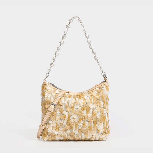 Champagne and ivory large-disc sequin shoulder bag with baroque faux-pearl beaded chain strap and silver-tone zip closure