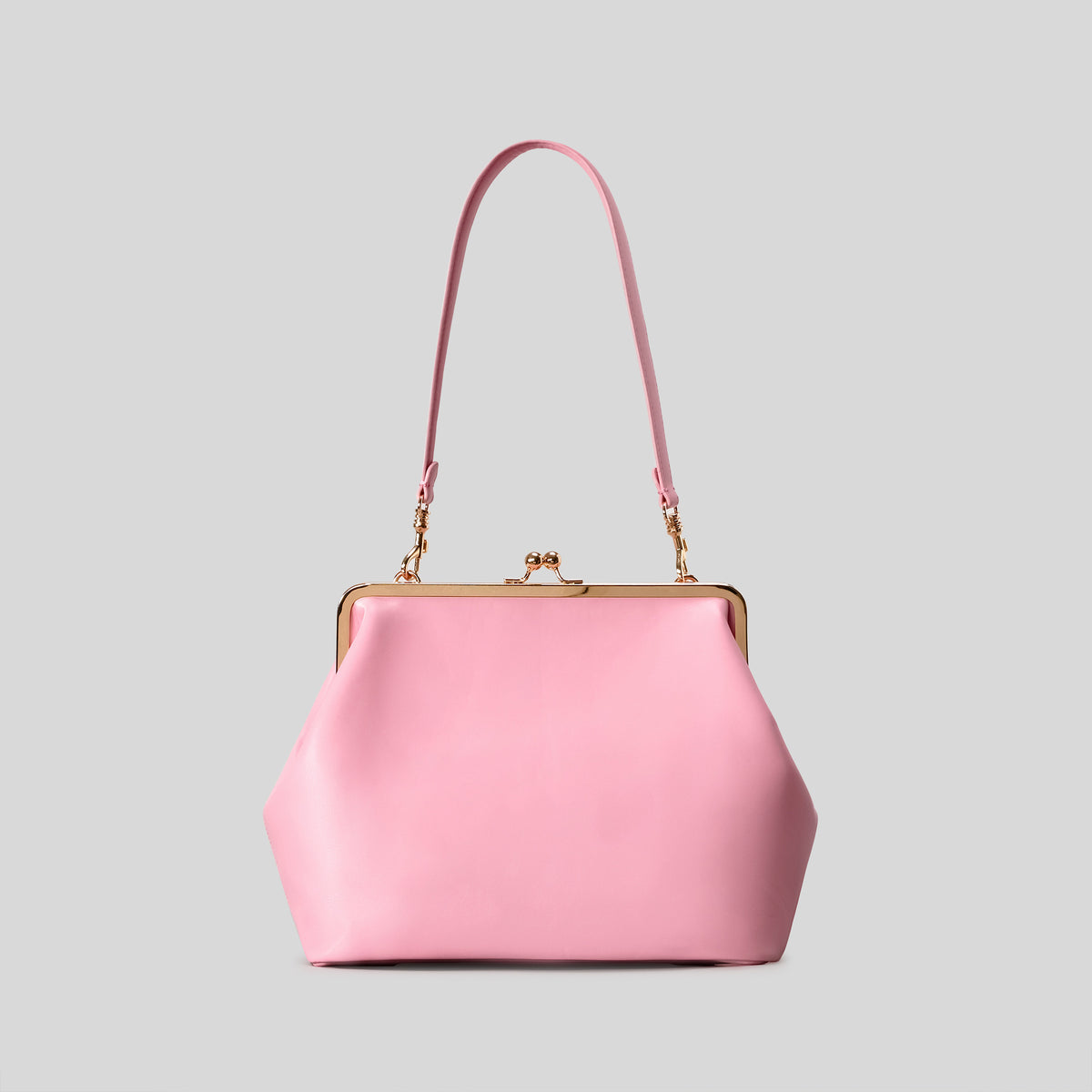 Oversized kiss-lock frame handbag with gold-tone metal clasp and smooth leather-look finish, detail view 8