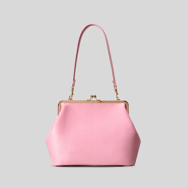 Oversized kiss-lock frame handbag with gold-tone metal clasp and smooth leather-look finish, detail view 8