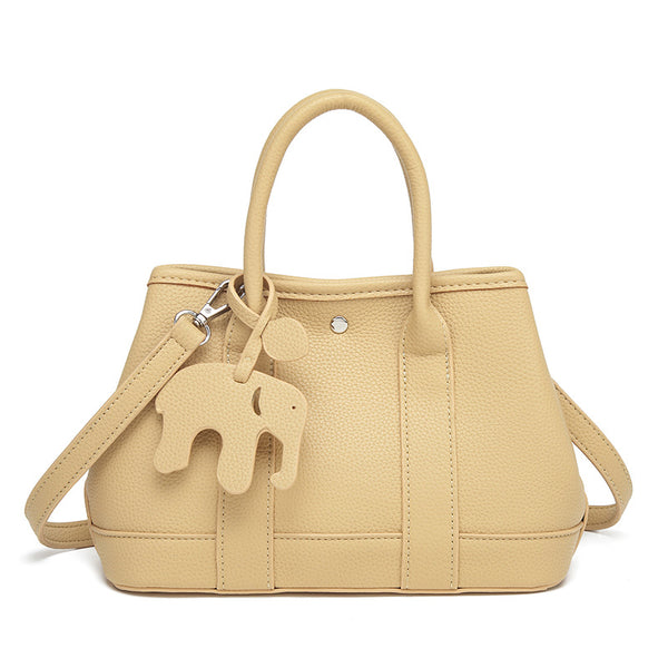 Structured pebbled leather-look top-handle tote bag with elephant charm and detachable shoulder strap, detail view 8
