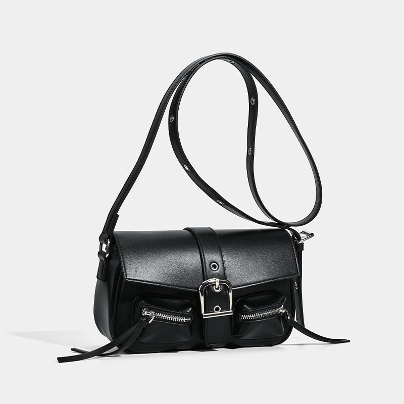 Structured flap crossbody bag with front buckle strap and dual zip pockets in smooth leather-look finish with silver-tone