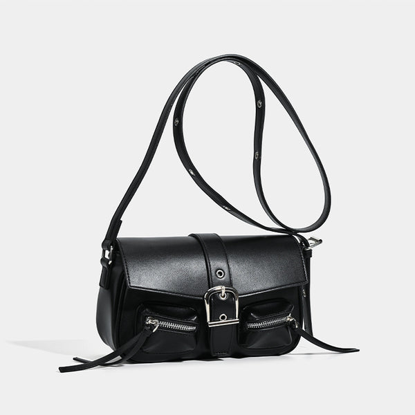 Structured flap crossbody bag with front buckle strap and dual zip pockets in smooth leather-look finish with silver-tone