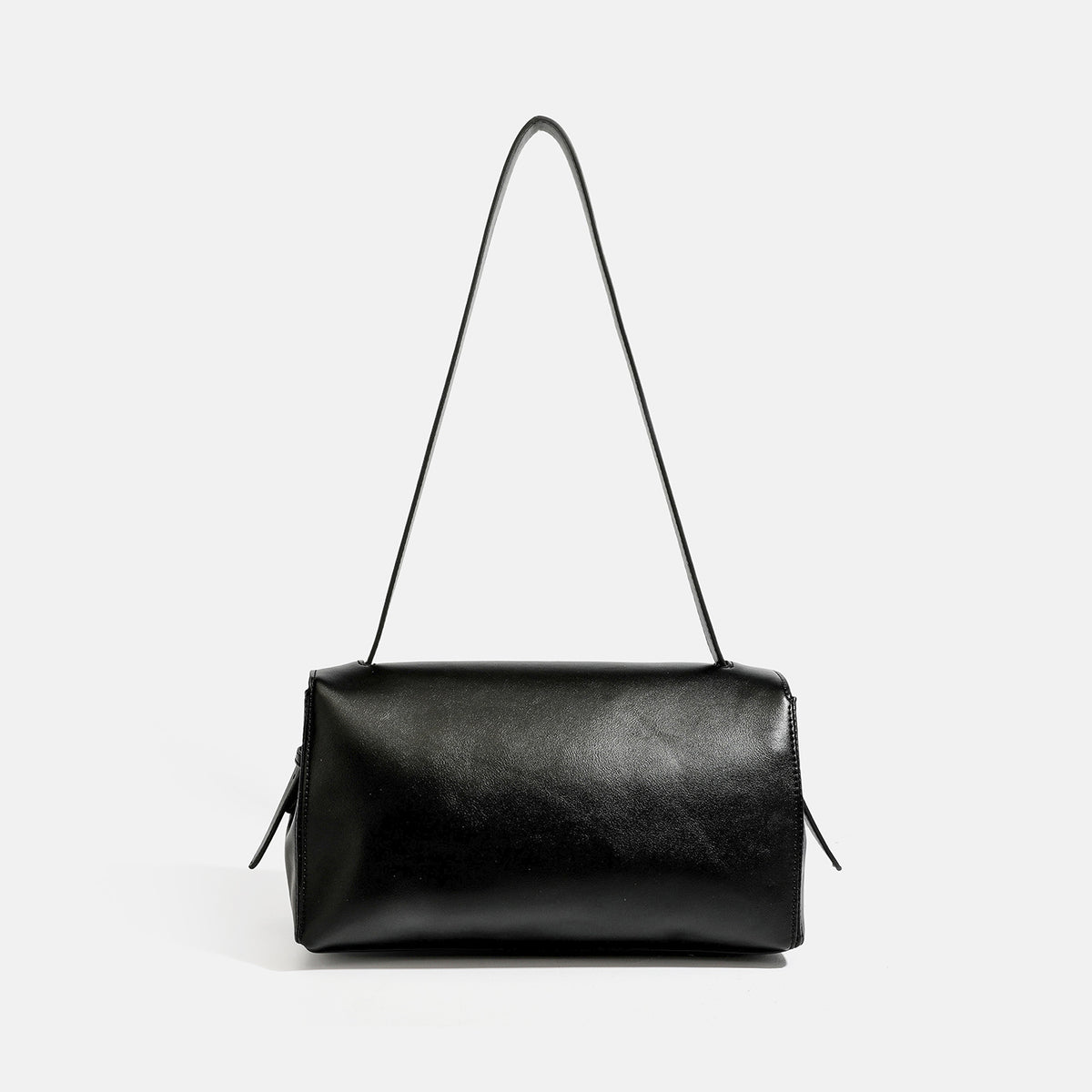 Structured rectangular flap shoulder bag with smooth leather-look finish, silver-tone turn-lock clasp, and long slim