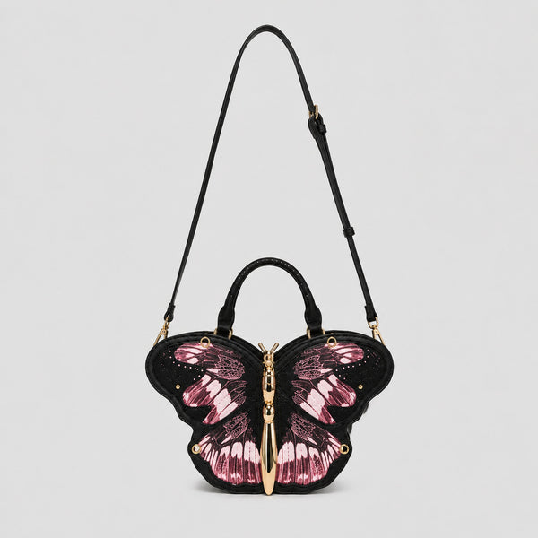 Schwarze Handtasche in Schmetterlingsform mit rosafarbenem Flügelprint und goldfarbenem, skulpturalem Schmetterlingskörper als Zipper, Detailansicht 13