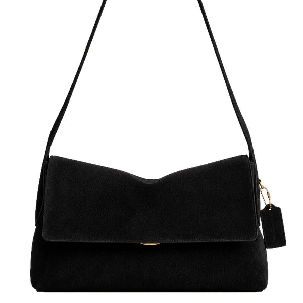 Rectangular matte suede-finish flap shoulder bag with slim dark strap and gold-tone turn-lock hardware, detail view 5