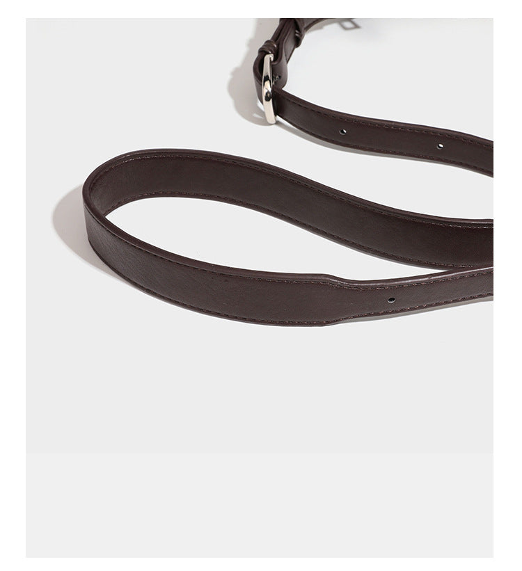 Deep chocolate suede-look hobo shoulder bag with tonal paisley floral embroidery, smooth dark leather-look trim, top zip