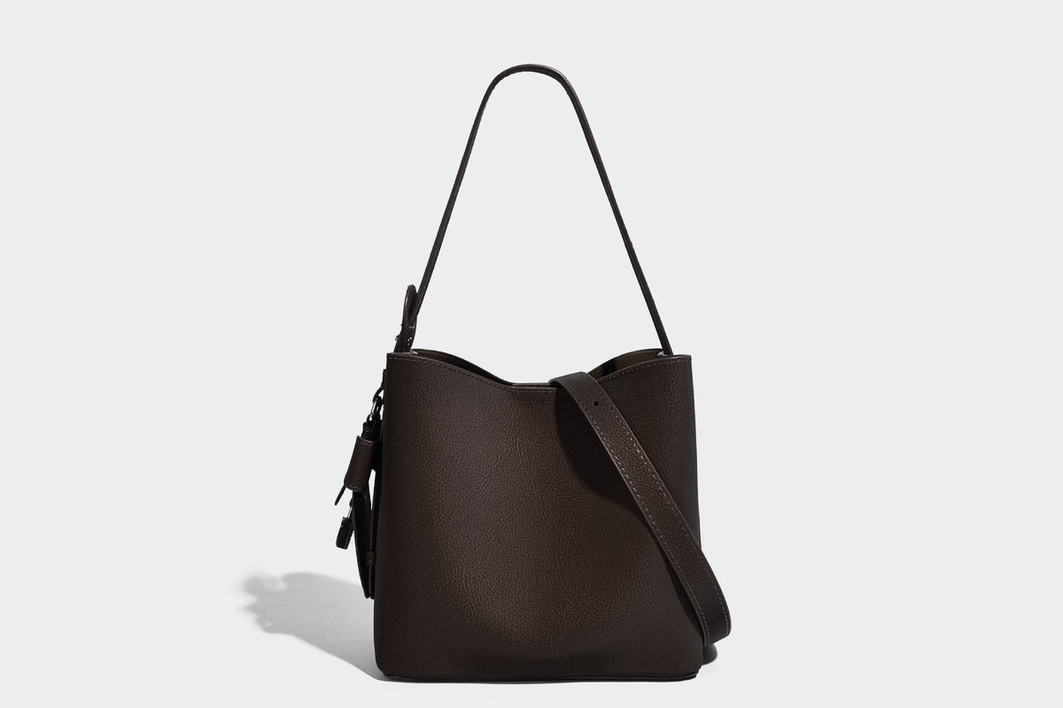 Pebbled leather-look bucket shoulder bag with zip inner pouch and adjustable crossbody strap, detail view 11