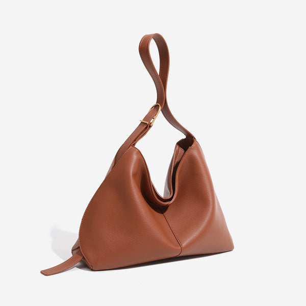 Soft pebbled leather-look hobo shoulder bag with crescent dipped opening, central seam, and adjustable strap, detail view 3