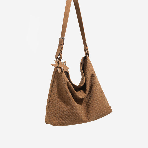 Slouchy woven hobo shoulder bag with matte suede-like finish, adjustable strap, and star charm hardware, detail view 3