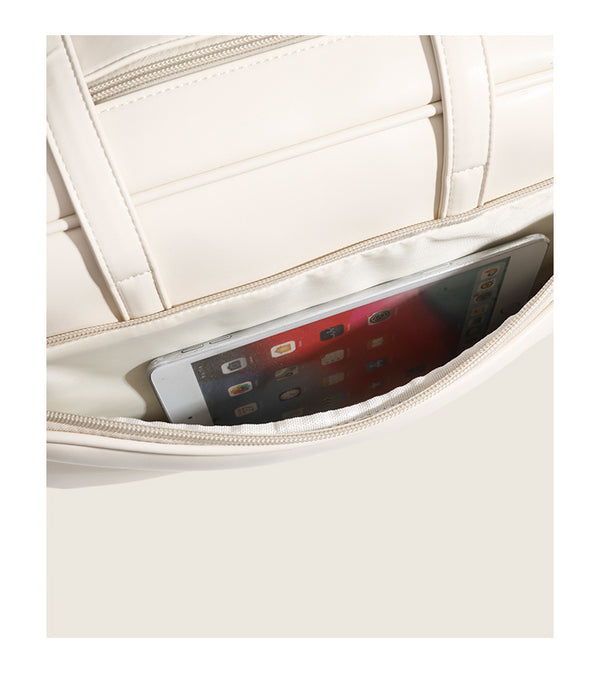 Large structured rectangular leather-look shoulder bag with dual zip compartments and double top handles, detail view 10