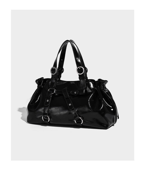 Glossy patent-look slouchy tote bag with ruched drawstring sides, dual top handles, silver ring hardware, and detachable