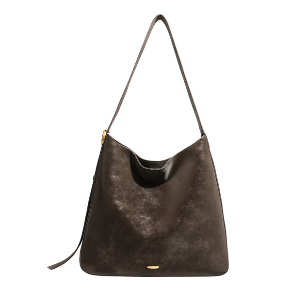 Large slouchy hobo tote bag in distressed dark brown leather-look finish with long shoulder strap, gold-tone ring hardware