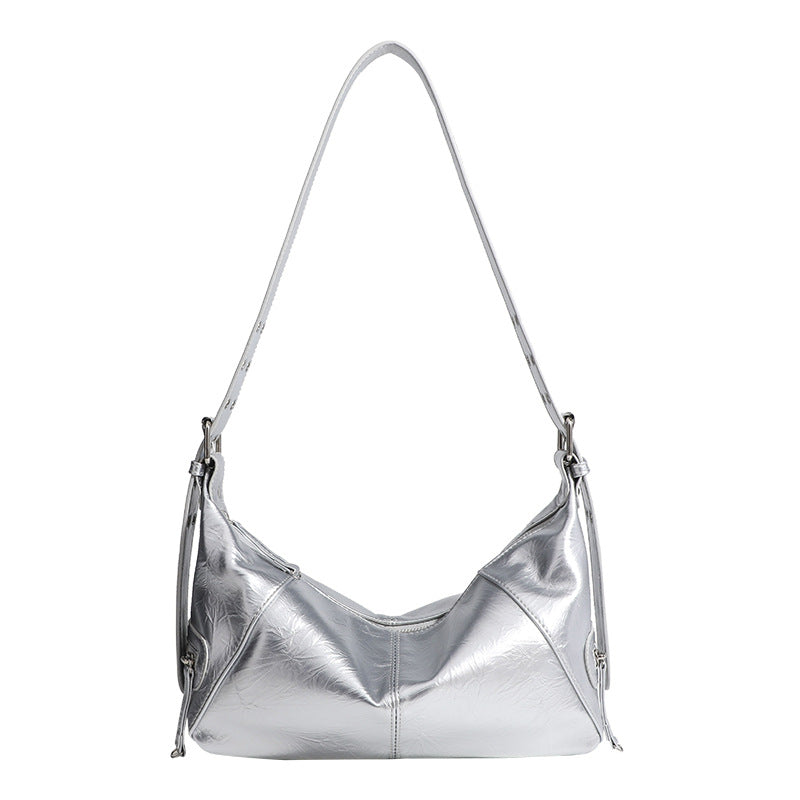 Glossy crinkled mini hobo shoulder bag with studded adjustable strap and silver-tone hardware, detail view 5