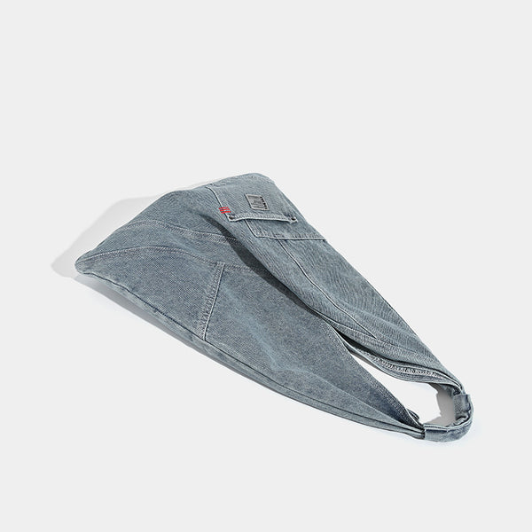 Washed denim slouch tote bag with patch pocket and contrast stitching, detail view 4