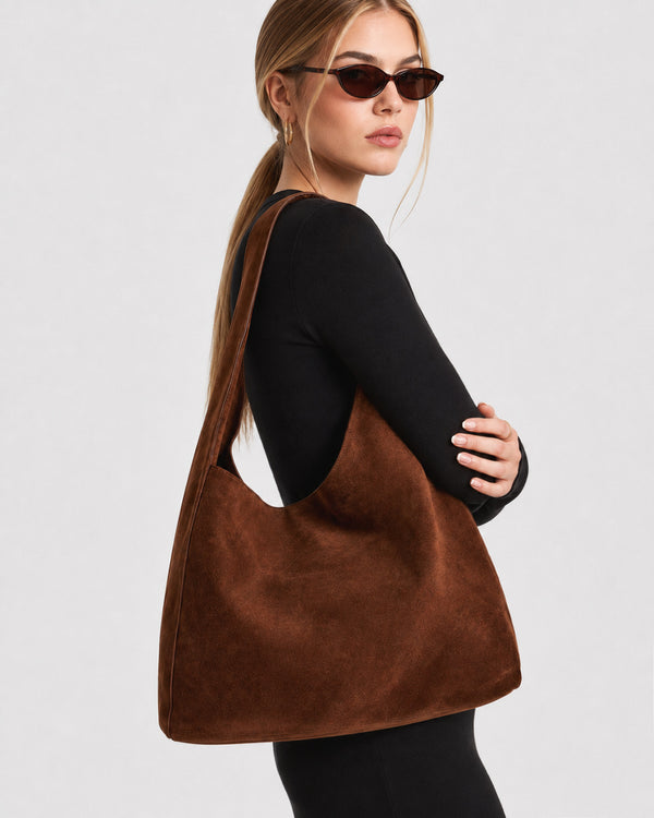 Large slouchy hobo shoulder bag in brushed suede-like finish with single flat strap and unstructured body, detail view 12