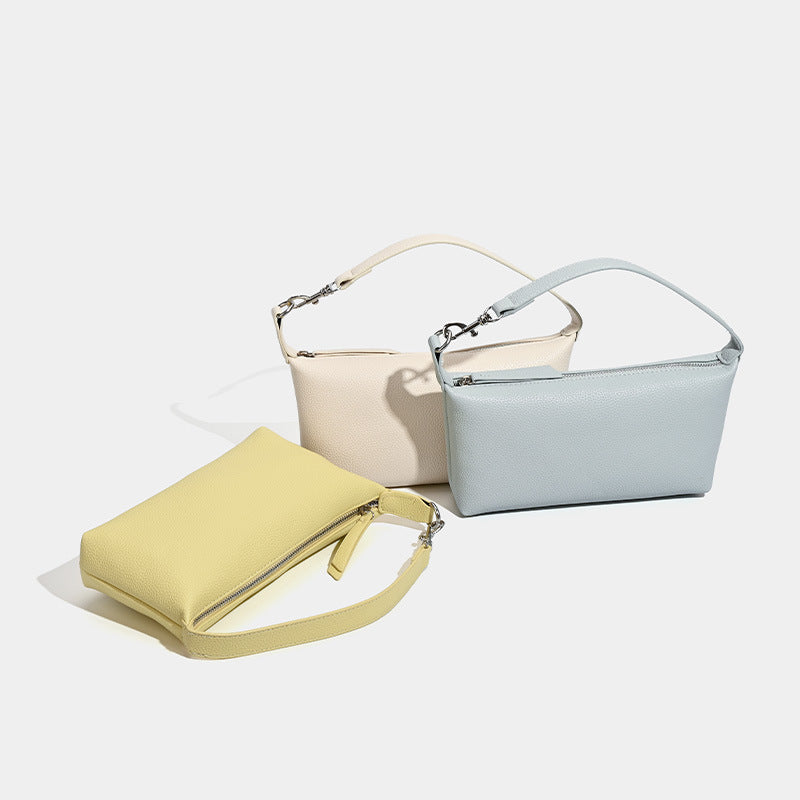 Small pebbled zip-top hobo bag with detachable adjustable strap and silver-tone hardware, detail view 2