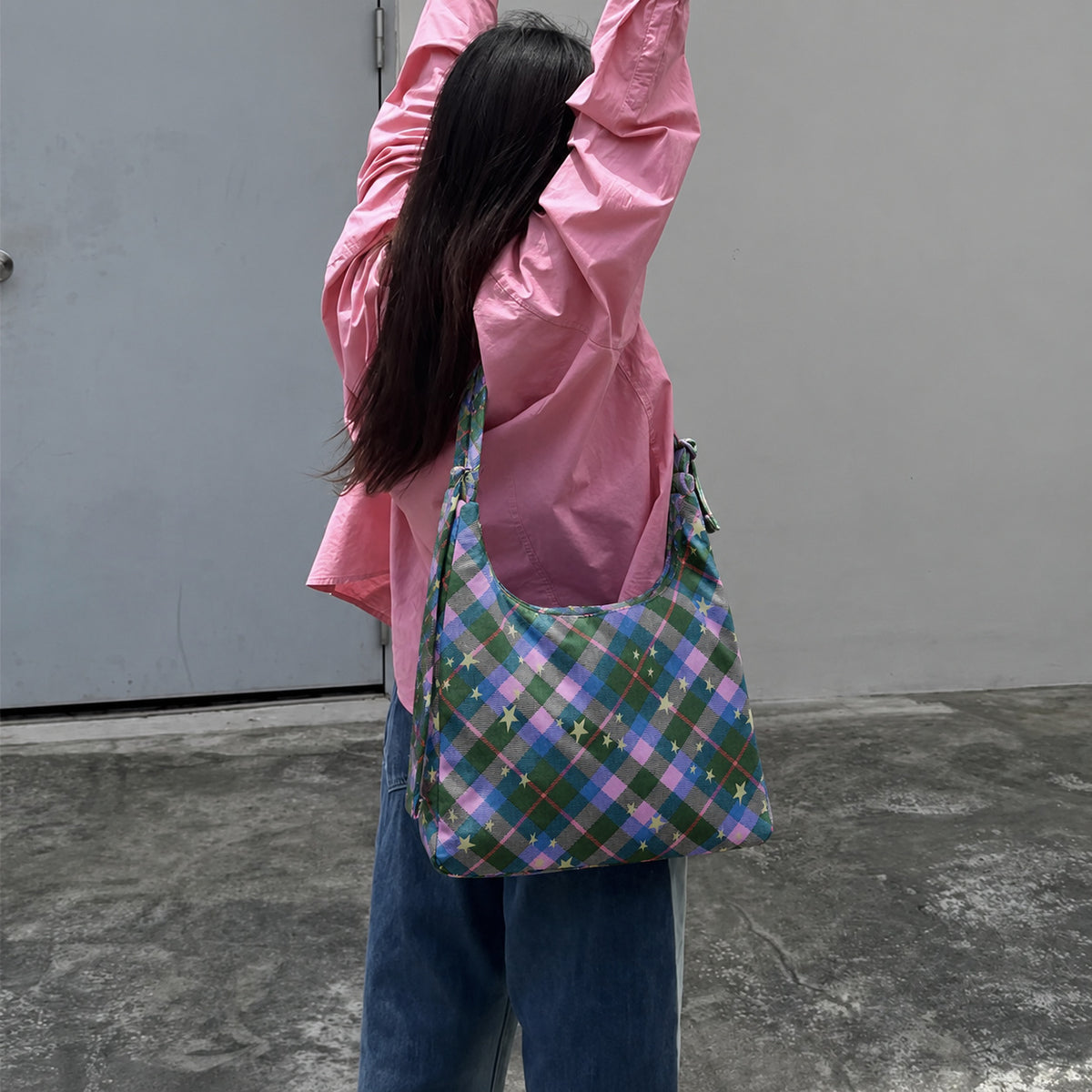 Multicolor plaid and star print hobo shoulder bag with knotted strap and silver-tone zip closure, detail view 13