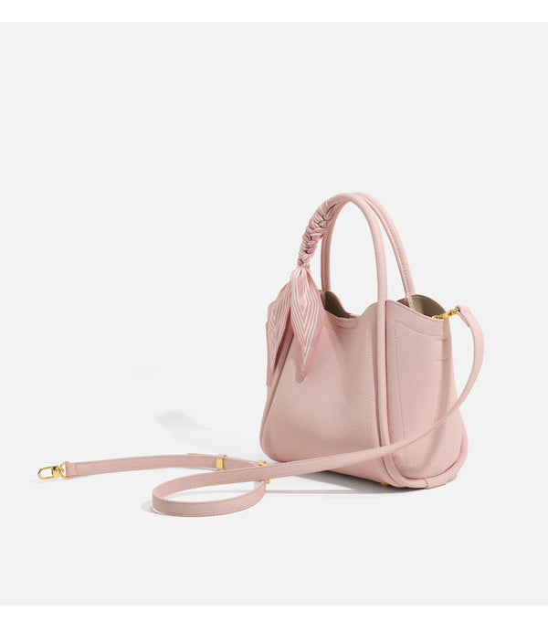 Pebbled leather-look bucket tote bag with scarf-wrapped top handle and gold-tone hardware, detail view 11