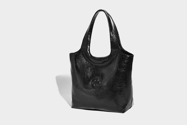 Glossy oil-wax leather-look open-top tote shoulder bag with embossed circular logo and long double straps, detail view 16