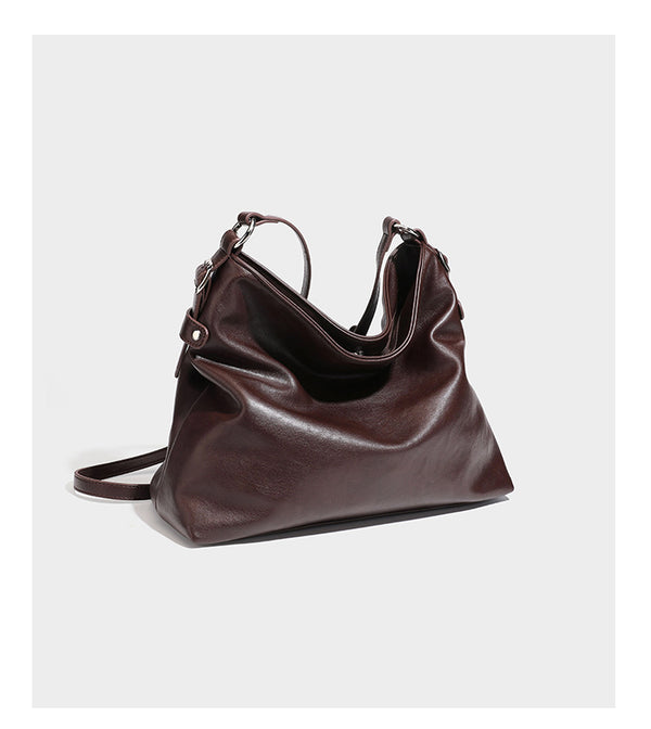 Large slouchy hobo shoulder bag in dark brown with smooth leather-look finish, adjustable strap, and silver-tone hardware