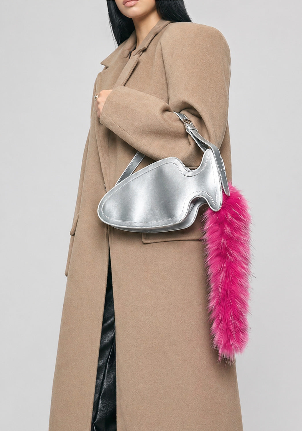 Fish-shaped pebbled leather-look crossbody bag with black faux-fur tail accent and adjustable shoulder strap, detail view 10