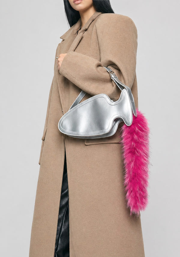 Fish-shaped pebbled leather-look crossbody bag with black faux-fur tail accent and adjustable shoulder strap, detail view 10