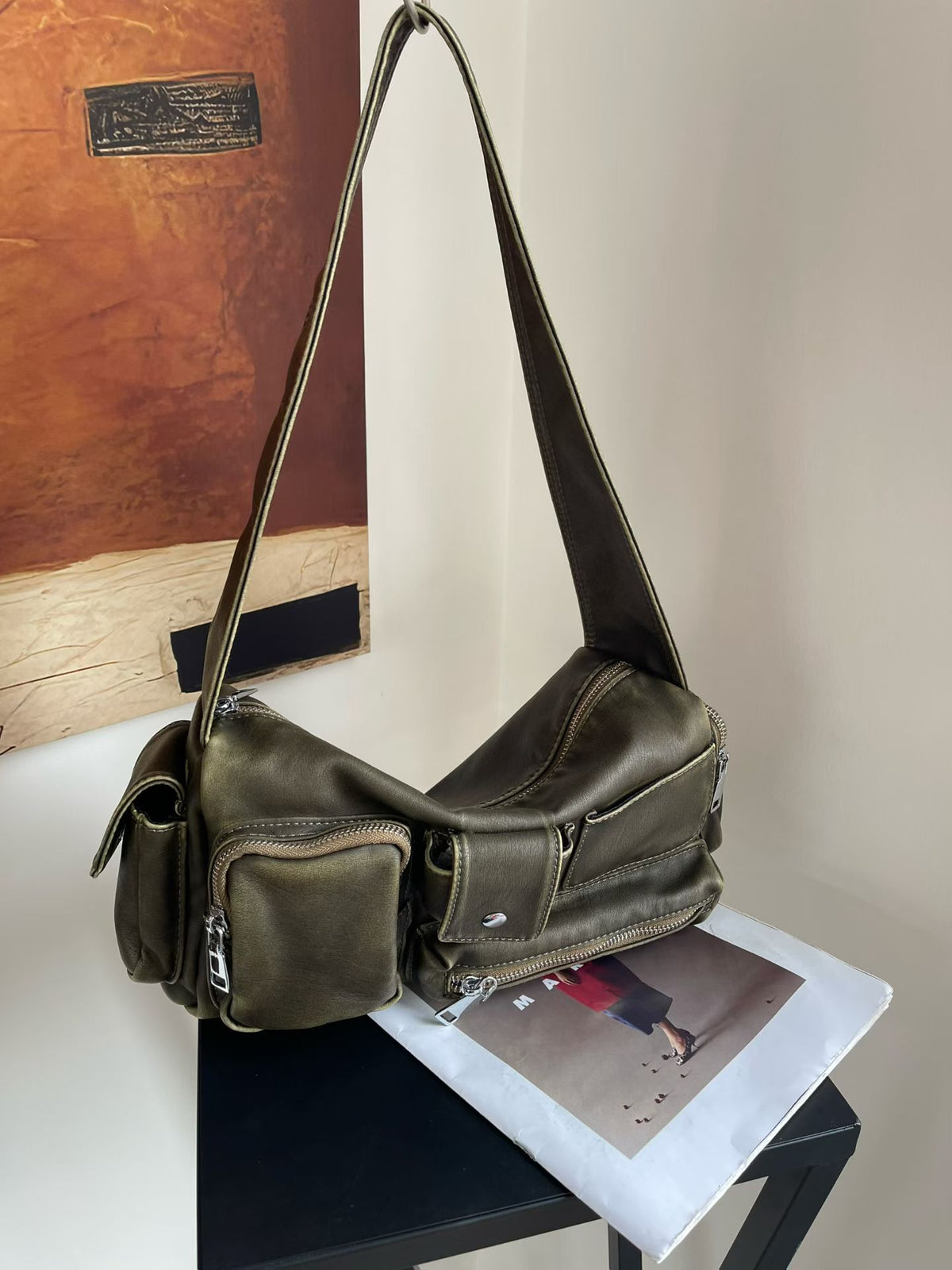 Slouchy multi-pocket leather-look shoulder bag with silver-tone hardware and adjustable strap, detail view 14