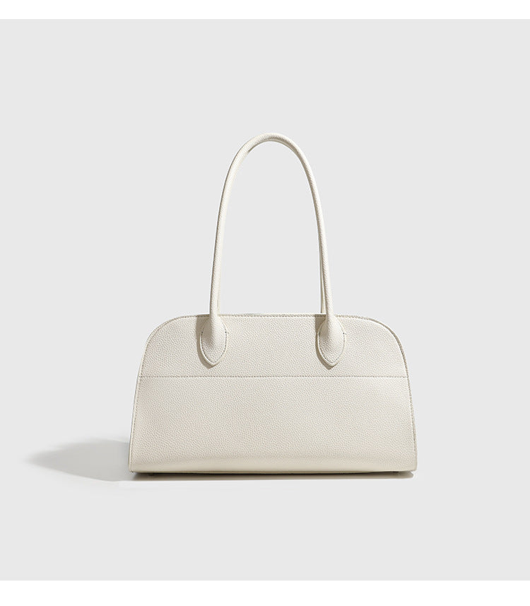 Large structured pebbled leather-look tote bag with double top handles and silver-tone hardware, detail view 10