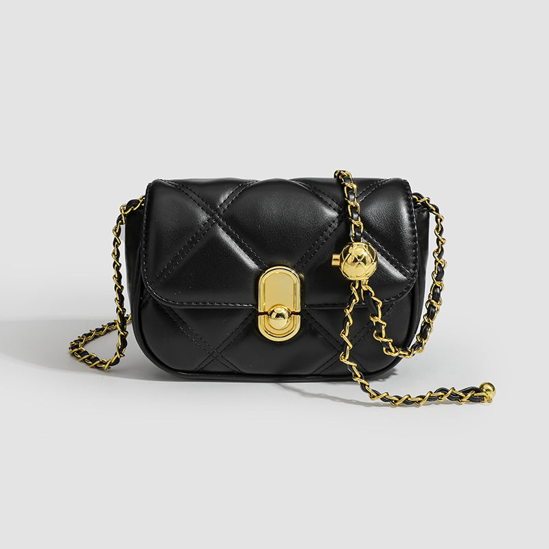 Compact diamond-quilted mini crossbody bag with gold-tone turn-lock closure and woven chain strap, detail view 7