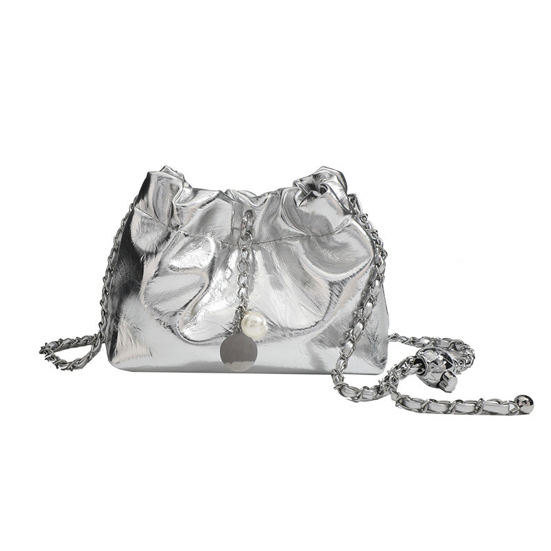 Small ruched drawstring bucket bag with twisted-link chain strap and pearl charm pull, detail view 5