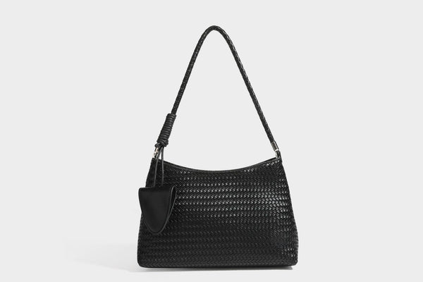 Woven-texture hobo shoulder bag in brown with braided top handle, adjustable crossbody strap, front flap pocket, and, detail