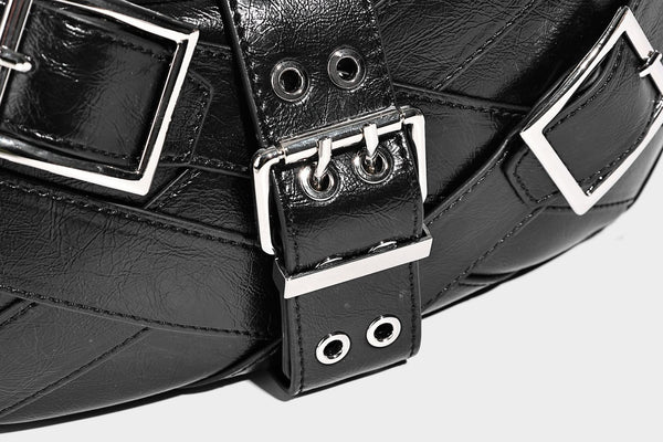Glossy crescent hobo bag with silver-tone grommets, square buckle straps, and top zipper closure, detail view 20