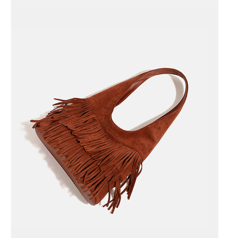 Cognac brown suede-look hobo shoulder bag with layered fringe trim and single loop strap, detail view 10