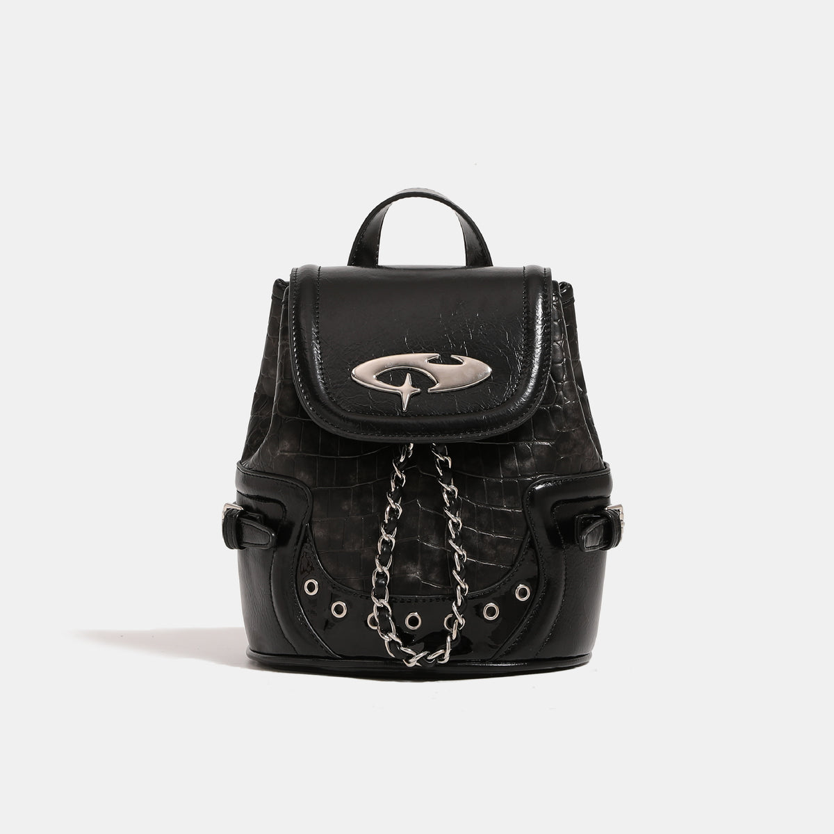 Croc-embossed mini backpack handbag with metallic silver flap, turn-lock closure, chain front detail, and top handle, detail