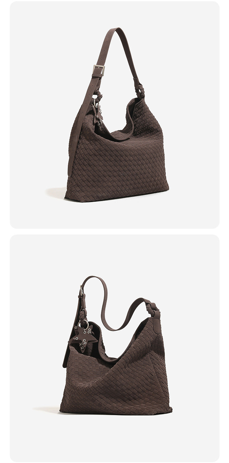 Slouchy woven hobo shoulder bag with matte suede-like finish, adjustable strap, and star charm hardware, detail view 10