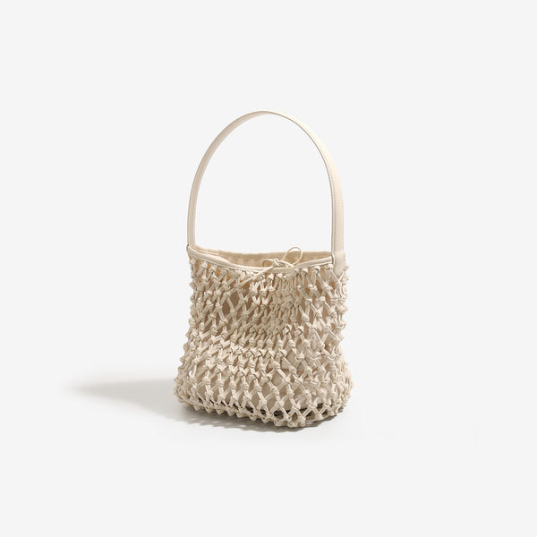 Shopper-Tasche im Beuteltaschenstil aus offen geflochtener Knotenkordel mit gewölbtem Henkel in Lederoptik und weichem Innenfutter, Detailansicht 7