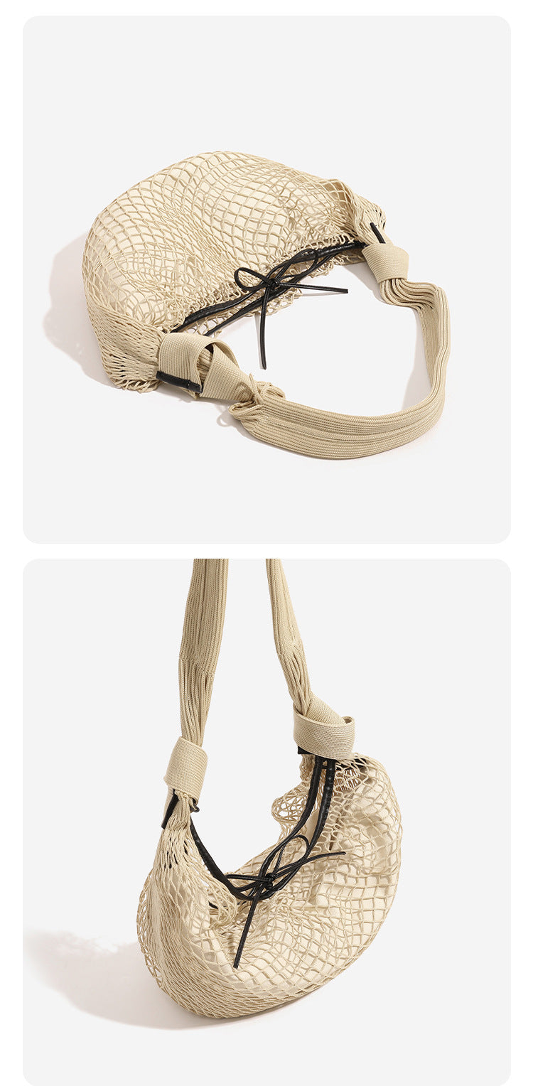 Crescent-shaped open-weave mesh shoulder bag with black drawstring cord tie and long padded strap, detail view 9